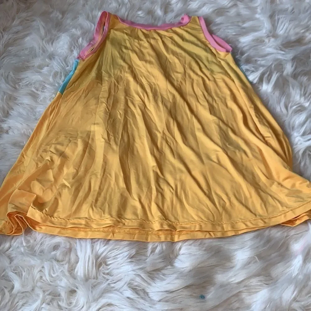 Loose dance a-line dress in yellow, turquoise and pink.